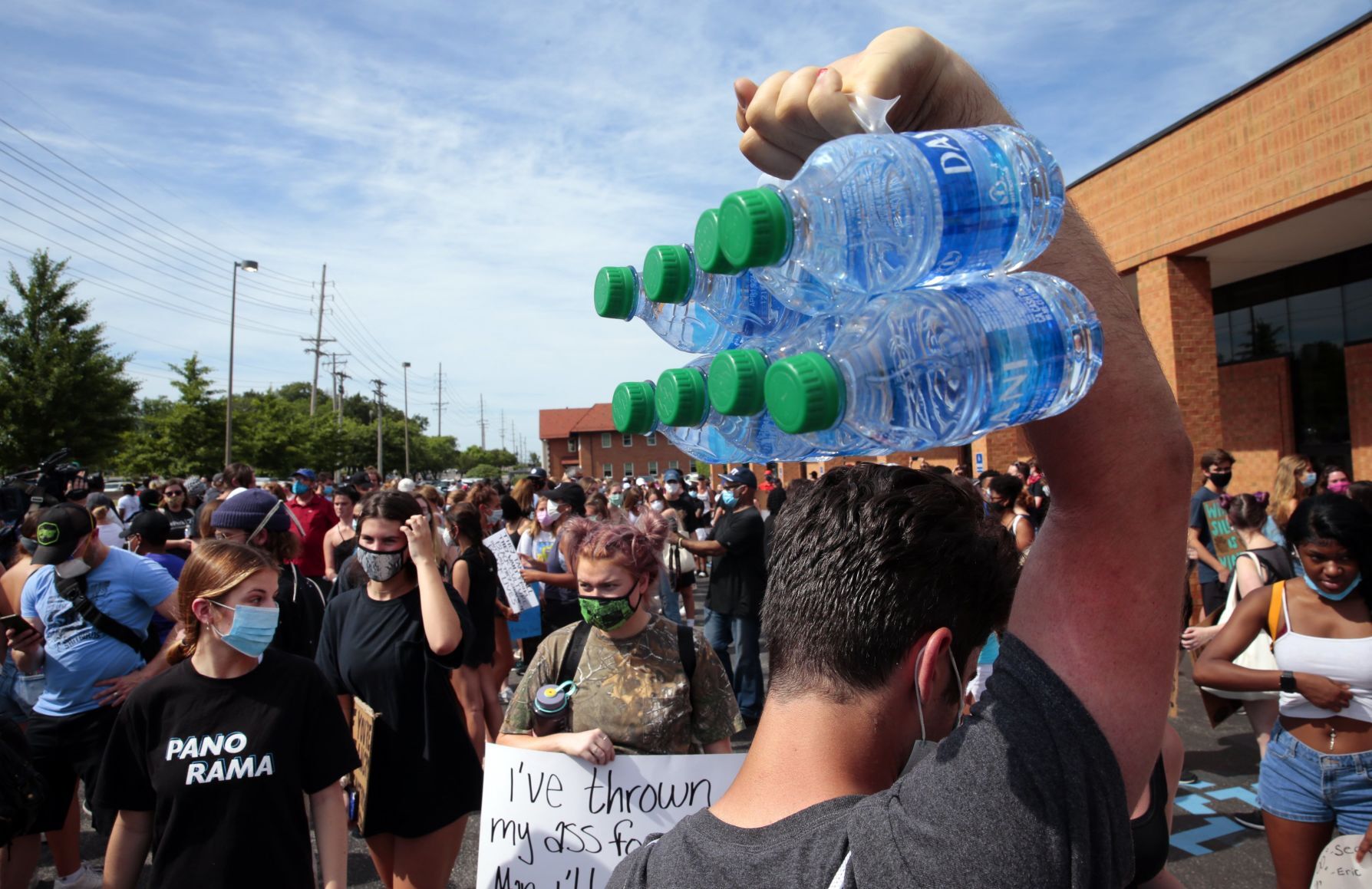 Youth march moves through wealthy suburbs
